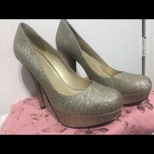 Gold heels , party heels